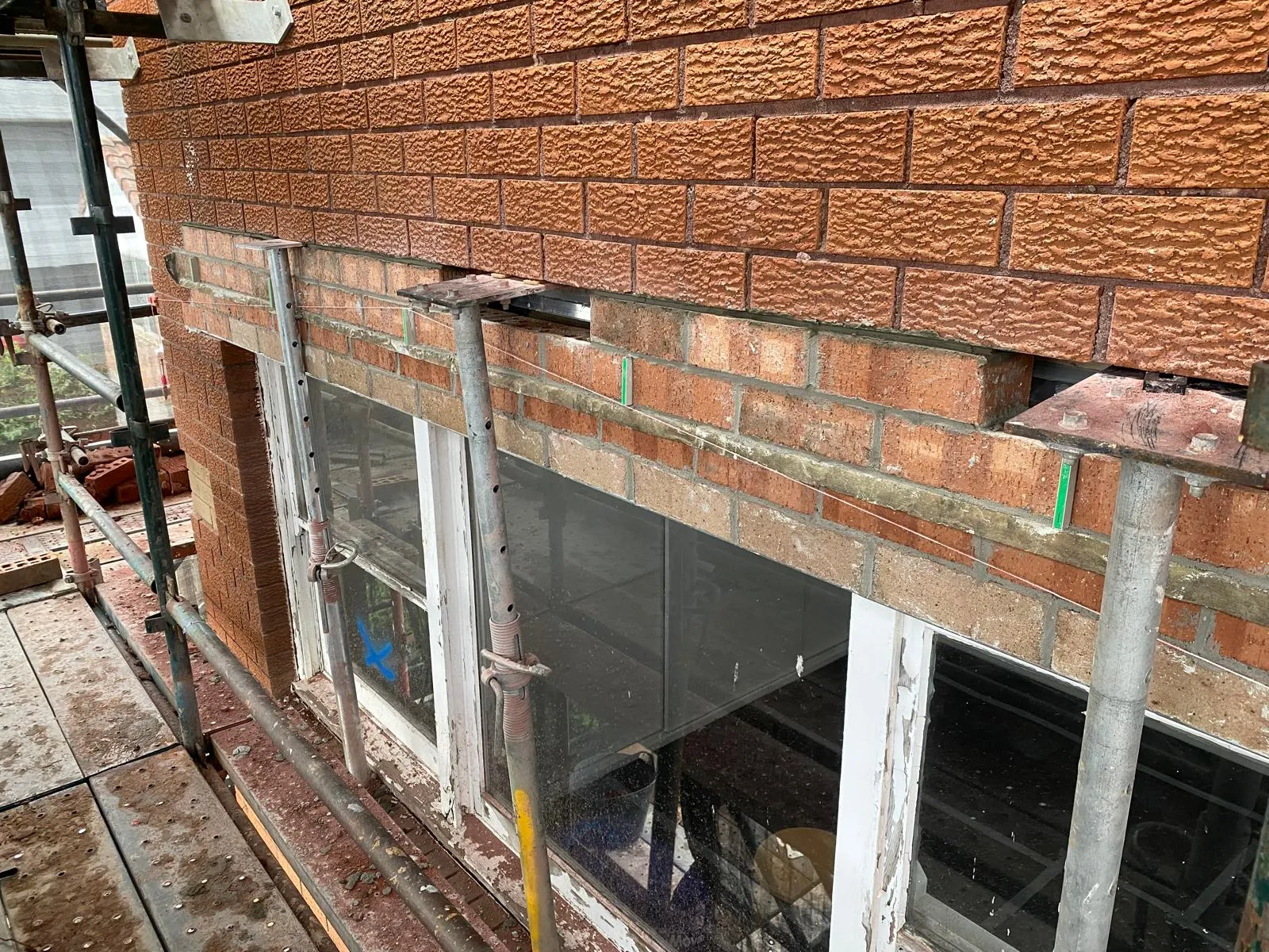 Cavity flashing remediation work on a Sydney brick wall