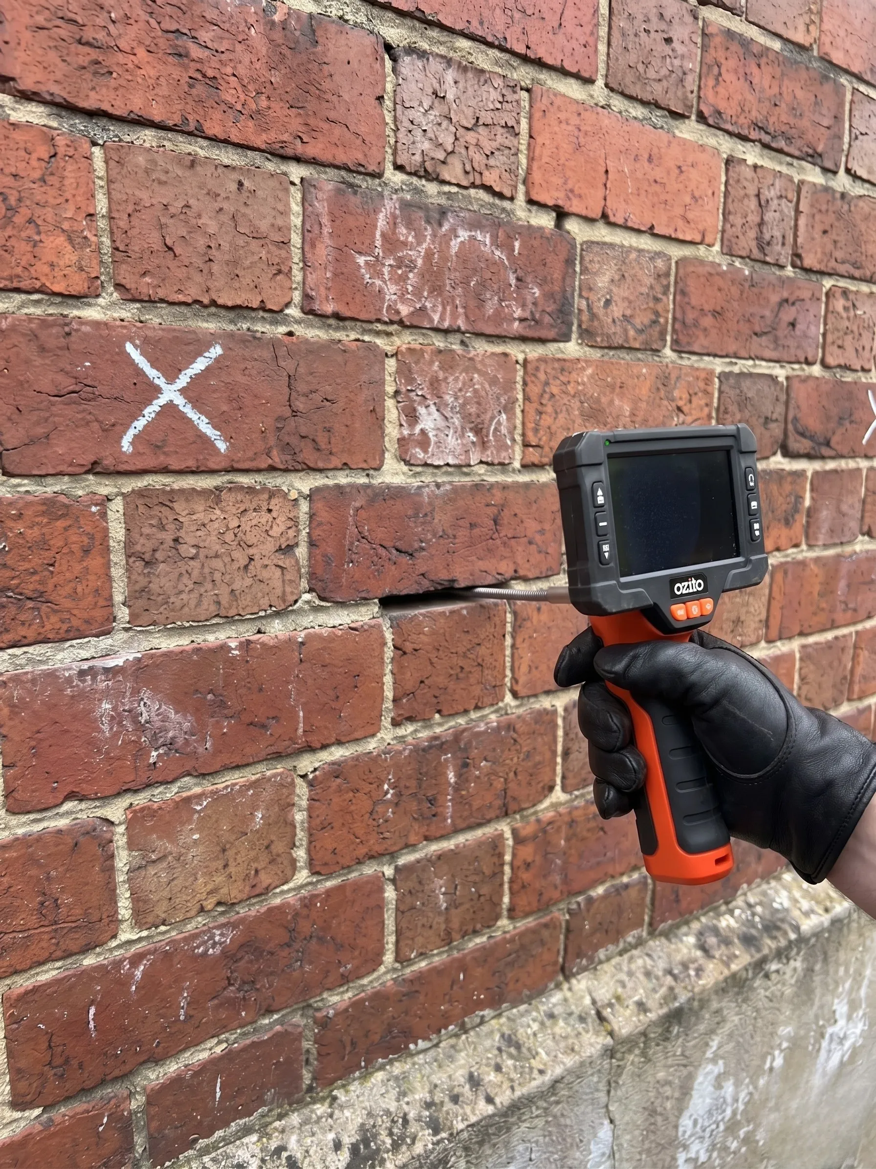 Remedial wall tie replacement on a Sydney brick wall